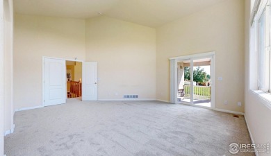 Prepare to be captivated by the allure of this stunning patio on Highland Meadows Golf Course in Colorado - for sale on GolfHomes.com, golf home, golf lot