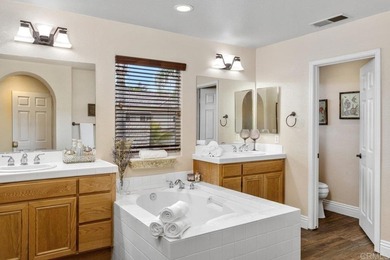 Nestled on a quiet cul-de-sac overlooking the Twin Oaks Golf on Twin Oaks Golf Course in California - for sale on GolfHomes.com, golf home, golf lot