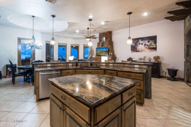 This stunning, solar powered home has the most amazing mountain on Picacho Hills Country Club in New Mexico - for sale on GolfHomes.com, golf home, golf lot