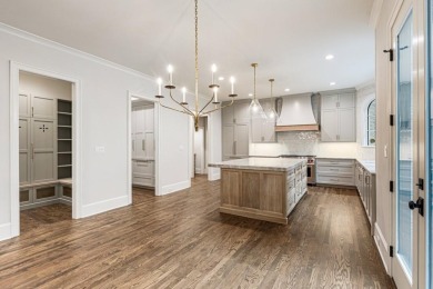 Discover Unparalleled Luxury in the Coveted North Valley on Alpharetta Athletic Club West in Georgia - for sale on GolfHomes.com, golf home, golf lot