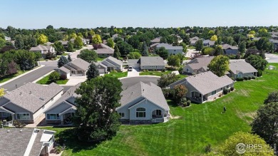 Prepare to be captivated by the allure of this stunning patio on Highland Meadows Golf Course in Colorado - for sale on GolfHomes.com, golf home, golf lot
