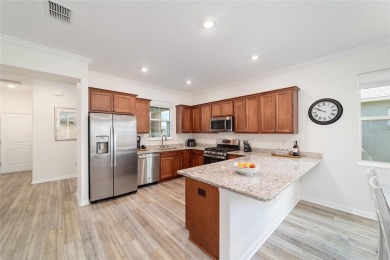 One-of-a-Kind Expanded Tamar in Longleaf Ridge - On Top of the on On Top of the World Golf Course in Florida - for sale on GolfHomes.com, golf home, golf lot
