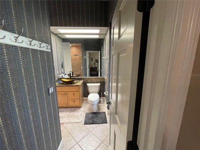 Owner financing is available.  This estate home sits on 1 acre on Black Diamond Ranch Golf Course in Florida - for sale on GolfHomes.com, golf home, golf lot