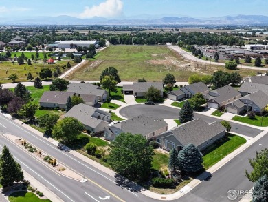 Prepare to be captivated by the allure of this stunning patio on Highland Meadows Golf Course in Colorado - for sale on GolfHomes.com, golf home, golf lot