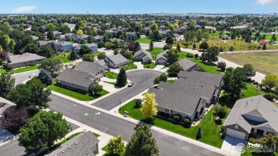 Prepare to be captivated by the allure of this stunning patio on Highland Meadows Golf Course in Colorado - for sale on GolfHomes.com, golf home, golf lot