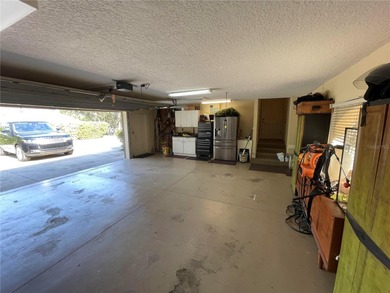 Owner financing is available.  This estate home sits on 1 acre on Black Diamond Ranch Golf Course in Florida - for sale on GolfHomes.com, golf home, golf lot