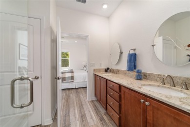 One-of-a-Kind Expanded Tamar in Longleaf Ridge - On Top of the on On Top of the World Golf Course in Florida - for sale on GolfHomes.com, golf home, golf lot
