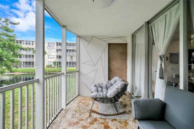 Discover the perfect first-floor corner unit with a tranquil on Presidential Estate Golf Course in Florida - for sale on GolfHomes.com, golf home, golf lot