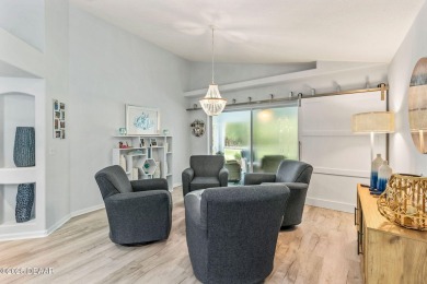 Walk in to an amazingly well-renovated home with tons of charm! on LPGA International Golf Course in Florida - for sale on GolfHomes.com, golf home, golf lot