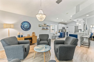 Walk in to an amazingly well-renovated home with tons of charm! on LPGA International Golf Course in Florida - for sale on GolfHomes.com, golf home, golf lot