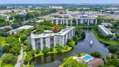 Must see! Highly desirable Cypress Bend community! Completely on Palm-Aire Country Club and Resort - Palms in Florida - for sale on GolfHomes.com, golf home, golf lot