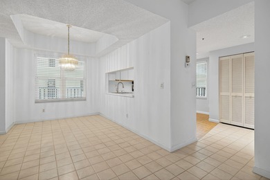 Experience island living at its finest! This spacious 2/2 condo on Ocean Club At the Hutchinson Island Beach Resort in Florida - for sale on GolfHomes.com, golf home, golf lot