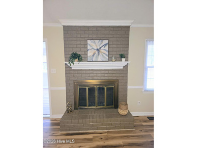 Loads of value in this inviting home backing to River Bend Golf on River Bend Golf and Country Club in North Carolina - for sale on GolfHomes.com, golf home, golf lot