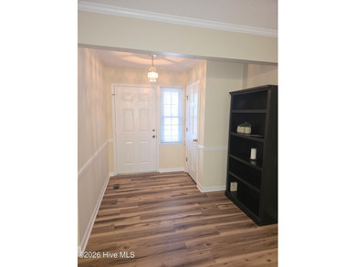 Loads of value in this inviting home backing to River Bend Golf on River Bend Golf and Country Club in North Carolina - for sale on GolfHomes.com, golf home, golf lot