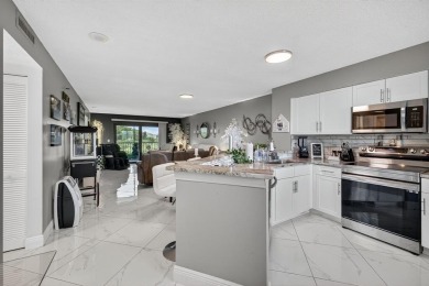 Must see! Highly desirable Cypress Bend community! Completely on Palm-Aire Country Club and Resort - Palms in Florida - for sale on GolfHomes.com, golf home, golf lot