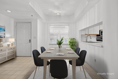 Experience island living at its finest! This spacious 2/2 condo on Ocean Club At the Hutchinson Island Beach Resort in Florida - for sale on GolfHomes.com, golf home, golf lot