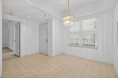 Experience island living at its finest! This spacious 2/2 condo on Ocean Club At the Hutchinson Island Beach Resort in Florida - for sale on GolfHomes.com, golf home, golf lot