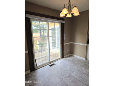 Loads of value in this inviting home backing to River Bend Golf on River Bend Golf and Country Club in North Carolina - for sale on GolfHomes.com, golf home, golf lot