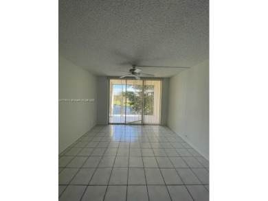 This 1 bed/1.5 bath condo on the top floor features a on Pine Island Ridge Country Club in Florida - for sale on GolfHomes.com, golf home, golf lot