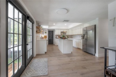Welcome Home! This 4-bedroom, 2.5-bath home has been on Northdale Golf and Tennis Club in Florida - for sale on GolfHomes.com, golf home, golf lot