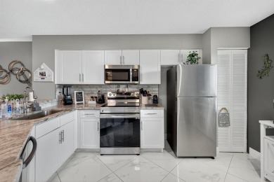 Must see! Highly desirable Cypress Bend community! Completely on Palm-Aire Country Club and Resort - Palms in Florida - for sale on GolfHomes.com, golf home, golf lot