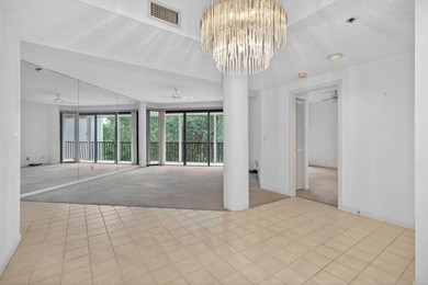 Experience island living at its finest! This spacious 2/2 condo on Ocean Club At the Hutchinson Island Beach Resort in Florida - for sale on GolfHomes.com, golf home, golf lot