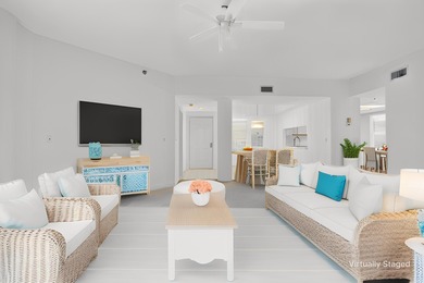 Experience island living at its finest! This spacious 2/2 condo on Ocean Club At the Hutchinson Island Beach Resort in Florida - for sale on GolfHomes.com, golf home, golf lot