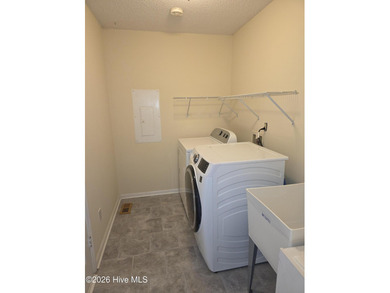 Loads of value in this inviting home backing to River Bend Golf on River Bend Golf and Country Club in North Carolina - for sale on GolfHomes.com, golf home, golf lot