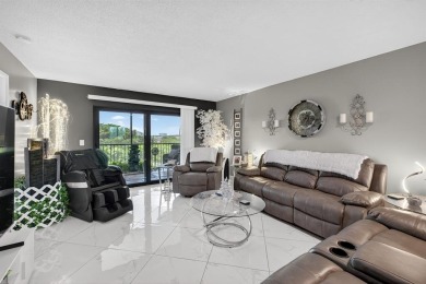 Must see! Highly desirable Cypress Bend community! Completely on Palm-Aire Country Club and Resort - Palms in Florida - for sale on GolfHomes.com, golf home, golf lot