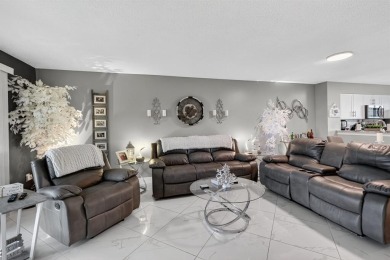 Must see! Highly desirable Cypress Bend community! Completely on Palm-Aire Country Club and Resort - Palms in Florida - for sale on GolfHomes.com, golf home, golf lot