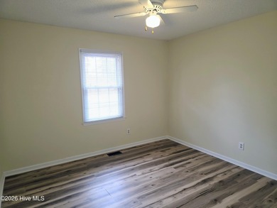 Loads of value in this inviting home backing to River Bend Golf on River Bend Golf and Country Club in North Carolina - for sale on GolfHomes.com, golf home, golf lot