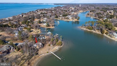 This lovely waterfront home is tucked away on a quiet cul-de-sac on Prospect Bay Country Club in Maryland - for sale on GolfHomes.com, golf home, golf lot
