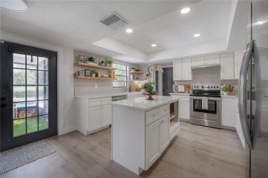 Welcome Home! This 4-bedroom, 2.5-bath home has been on Northdale Golf and Tennis Club in Florida - for sale on GolfHomes.com, golf home, golf lot