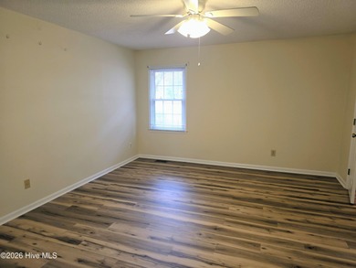 Loads of value in this inviting home backing to River Bend Golf on River Bend Golf and Country Club in North Carolina - for sale on GolfHomes.com, golf home, golf lot