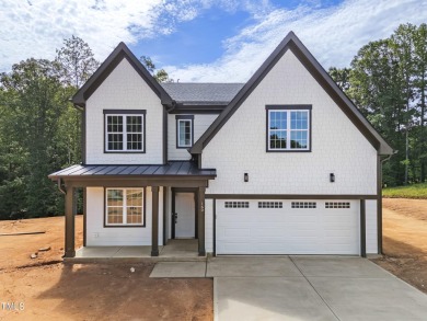 This gorgeous 5-bedroom, 3.5-bath home offers exceptional on Olde Liberty Golf and Country Club in North Carolina - for sale on GolfHomes.com, golf home, golf lot