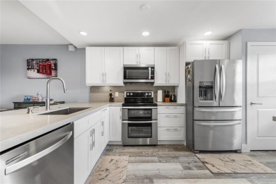 LOVE where you live in this beautifully renovated 4th Floor on Palm-Aire Country Club and Resort - Palms in Florida - for sale on GolfHomes.com, golf home, golf lot