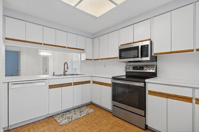 Experience island living at its finest! This spacious 2/2 condo on Ocean Club At the Hutchinson Island Beach Resort in Florida - for sale on GolfHomes.com, golf home, golf lot