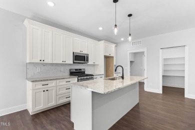 This gorgeous 5-bedroom, 3.5-bath home offers exceptional on Olde Liberty Golf and Country Club in North Carolina - for sale on GolfHomes.com, golf home, golf lot