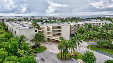 Experience island living at its finest! This spacious 2/2 condo on Ocean Club At the Hutchinson Island Beach Resort in Florida - for sale on GolfHomes.com, golf home, golf lot