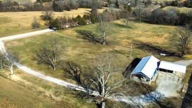 Discover the charm of country living with the convenience of on Coopers Hawk in Arkansas - for sale on GolfHomes.com, golf home, golf lot