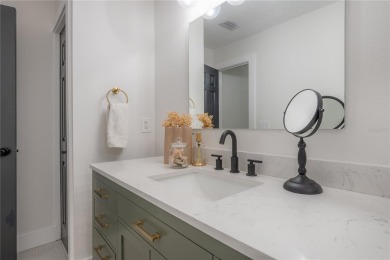 Welcome Home! This 4-bedroom, 2.5-bath home has been on Northdale Golf and Tennis Club in Florida - for sale on GolfHomes.com, golf home, golf lot