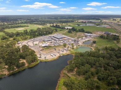 Escape to tranquility with this stunning, extraordinary on Mount Pleasant Country Club in Texas - for sale on GolfHomes.com, golf home, golf lot