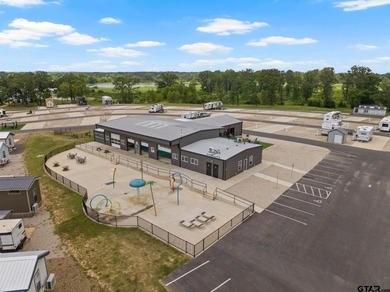 Escape to tranquility with this stunning, extraordinary on Mount Pleasant Country Club in Texas - for sale on GolfHomes.com, golf home, golf lot