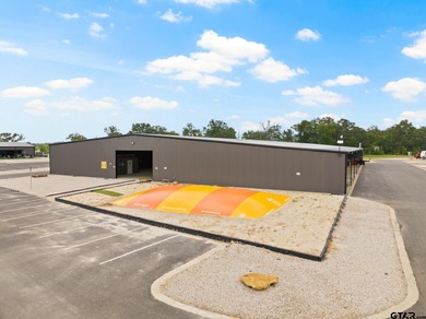 Escape to tranquility with this stunning, extraordinary on Mount Pleasant Country Club in Texas - for sale on GolfHomes.com, golf home, golf lot