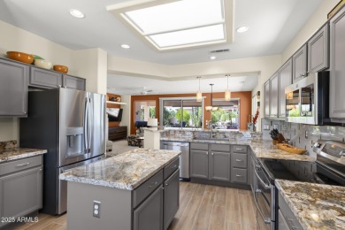 Uniquely positioned with picturesque views of both the on Sun City Grand Golf Couse and Club in Arizona - for sale on GolfHomes.com, golf home, golf lot