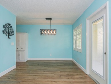 First Floor! Beautiful plank laminate floors w/ newer baseboard on Vero Beach South Golf Course in Florida - for sale on GolfHomes.com, golf home, golf lot