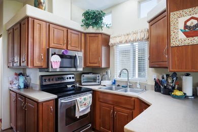 Wake up to breathtaking golf course views on Hole 14, where lush on Palm Creek Golf and RV Resort in Arizona - for sale on GolfHomes.com, golf home, golf lot