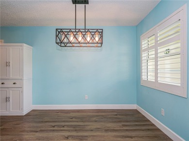 First Floor! Beautiful plank laminate floors w/ newer baseboard on Vero Beach South Golf Course in Florida - for sale on GolfHomes.com, golf home, golf lot