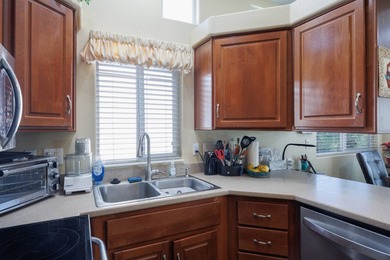 Wake up to breathtaking golf course views on Hole 14, where lush on Palm Creek Golf and RV Resort in Arizona - for sale on GolfHomes.com, golf home, golf lot