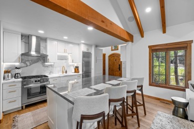 Discover luxury & convenience in this ski-in/ski-out cottage on Osprey Meadows at Tamarack Resort in Idaho - for sale on GolfHomes.com, golf home, golf lot